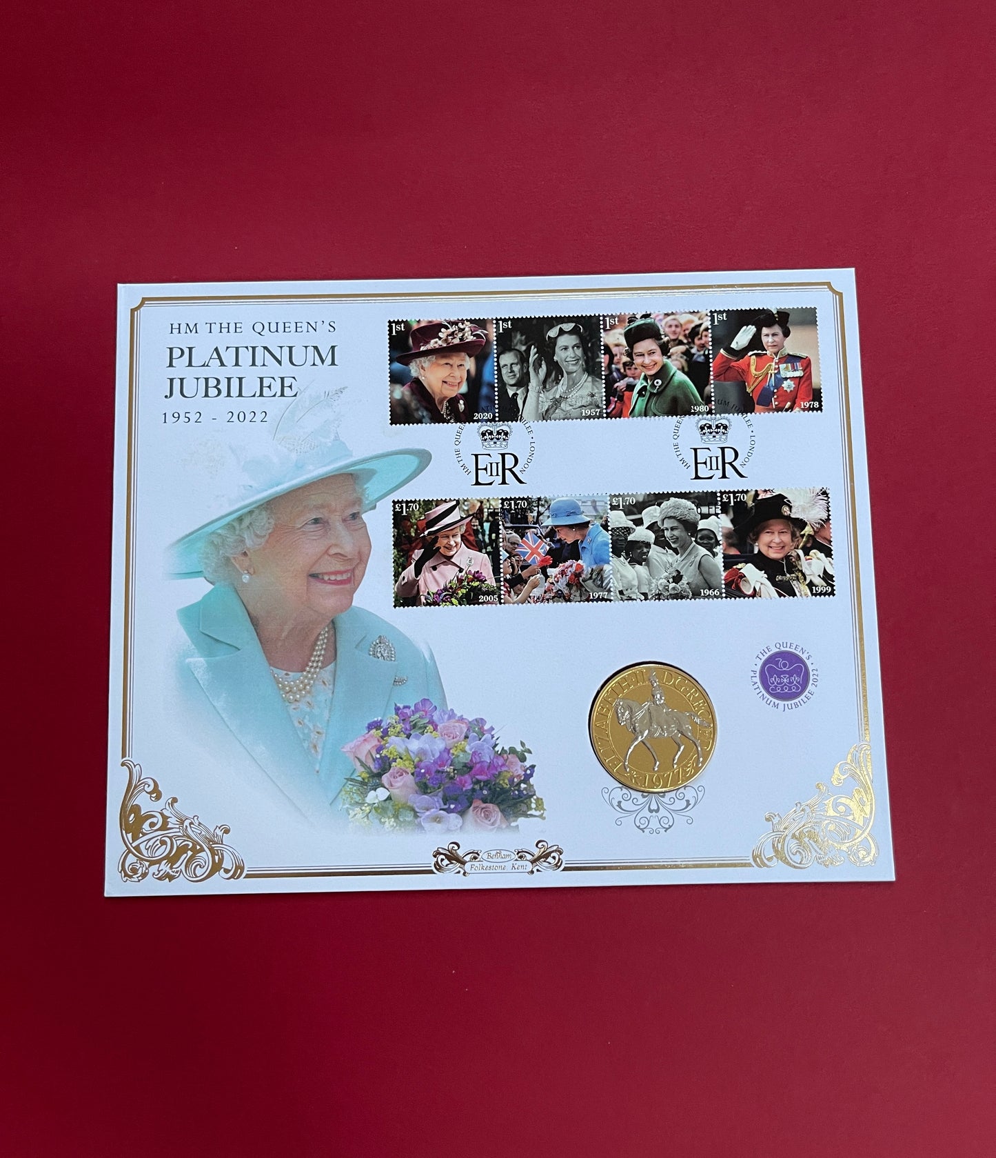 Elizabeth II,
1977 One Crown,
Queens Platinum Jubilee Commemorative,
Uncirculated, Gold Platinum Plated coin and stamp set,
With COA
2022 (B)