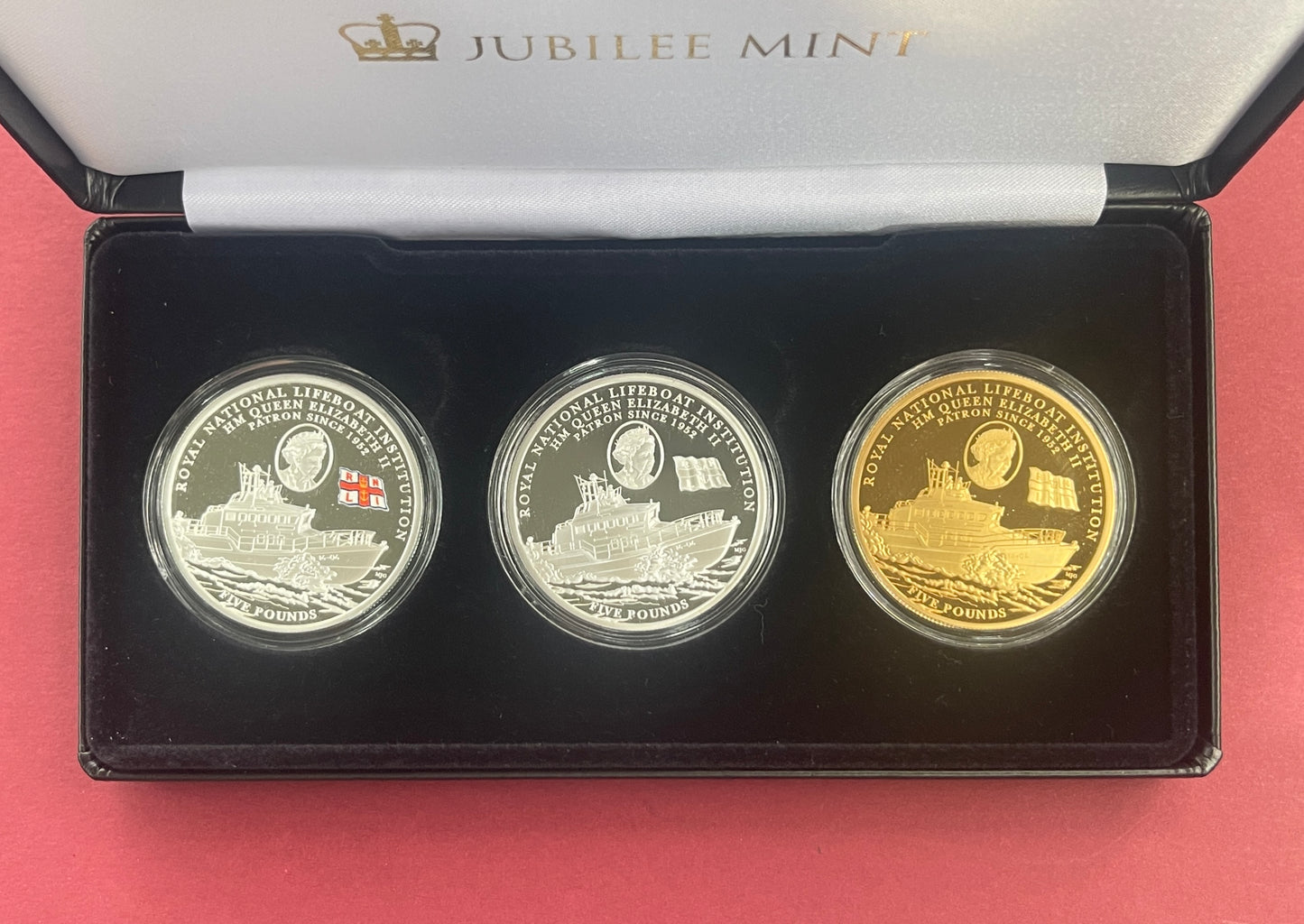 Elizabeth II,

Five Pound Coin Set,

£5, Silver and Gold Plated 3 Coin Set,

Royal National Lifeboat Institution,

Alderney,

With COA

2022 (B)